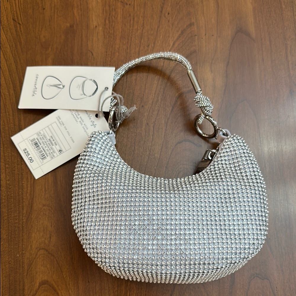 a new day Silver Clutch evening bag. Price firm